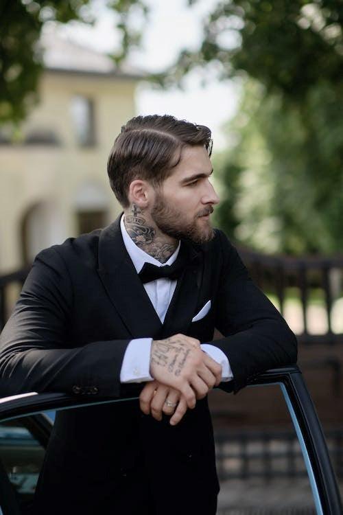 Navigating the Tuxedo vs. Suit Dilemma - Elegant Mensattire